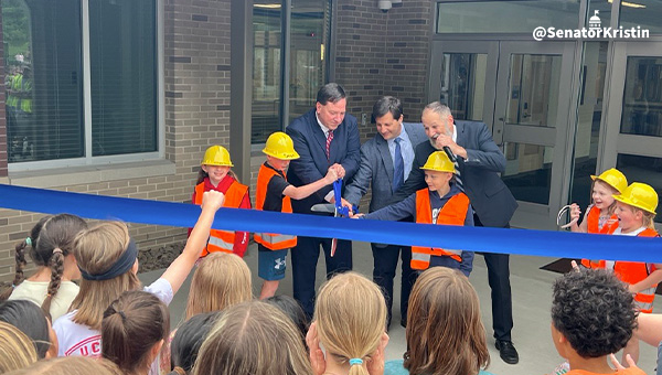 School leaders and students cut the ribbon at Leaders Heights Elementary