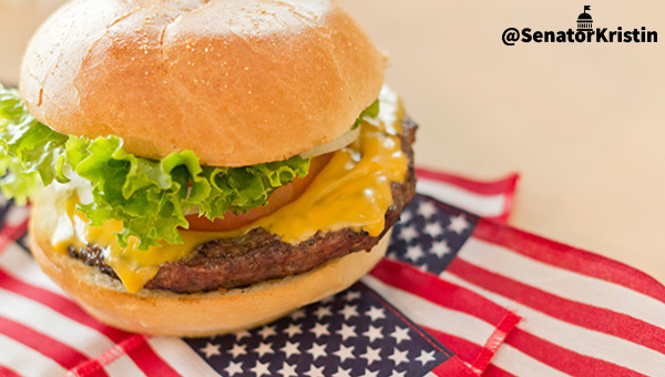 A burger atop US flags.